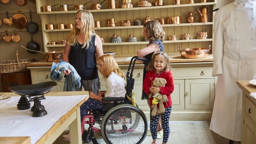 Visitors in the kitchen at Attingham Park, Shropshire